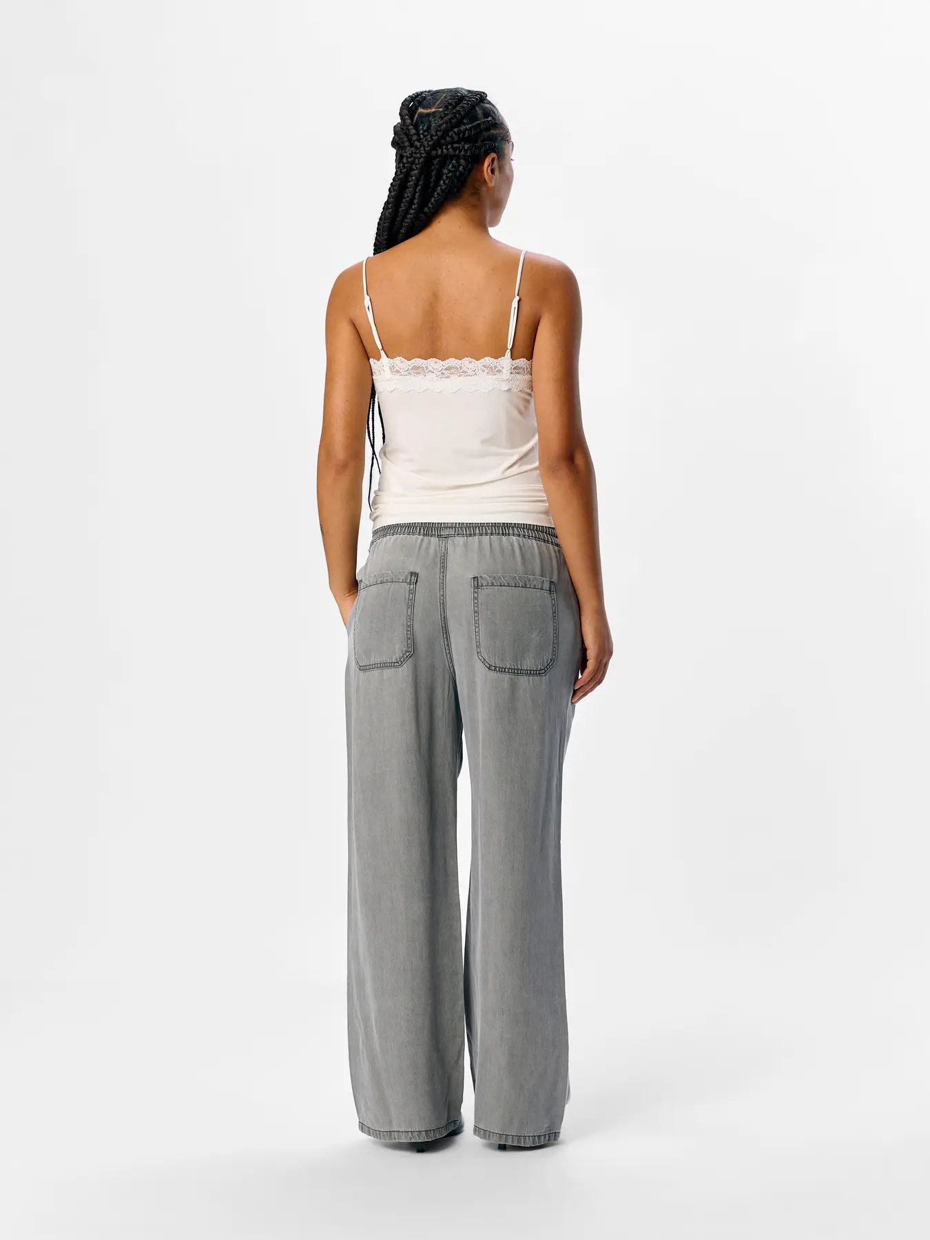 White 3 Top elástico mujer escote en V